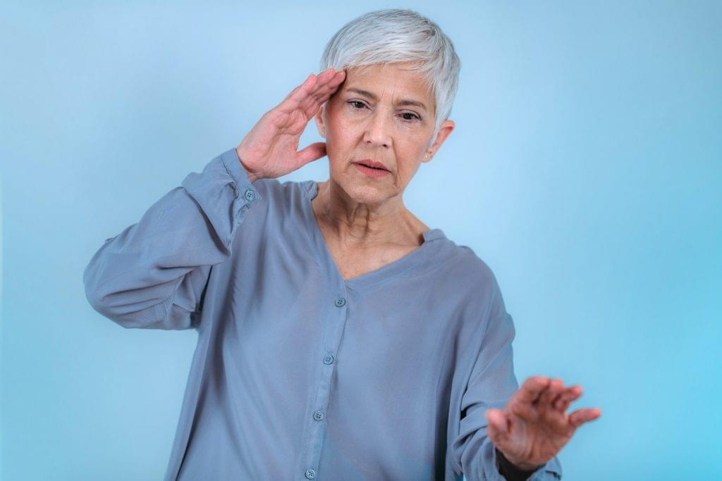 Vertigo. Senior Woman Suffering From Vertigo Dizziness.